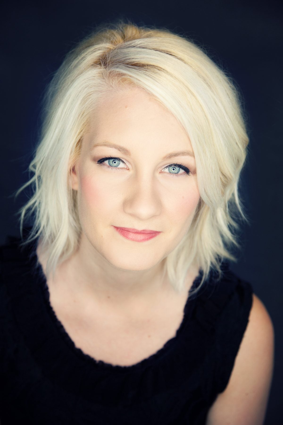 Alissa, blonding specialist and colorist at Quinn Vise Hair Design in Holland, Michigan.