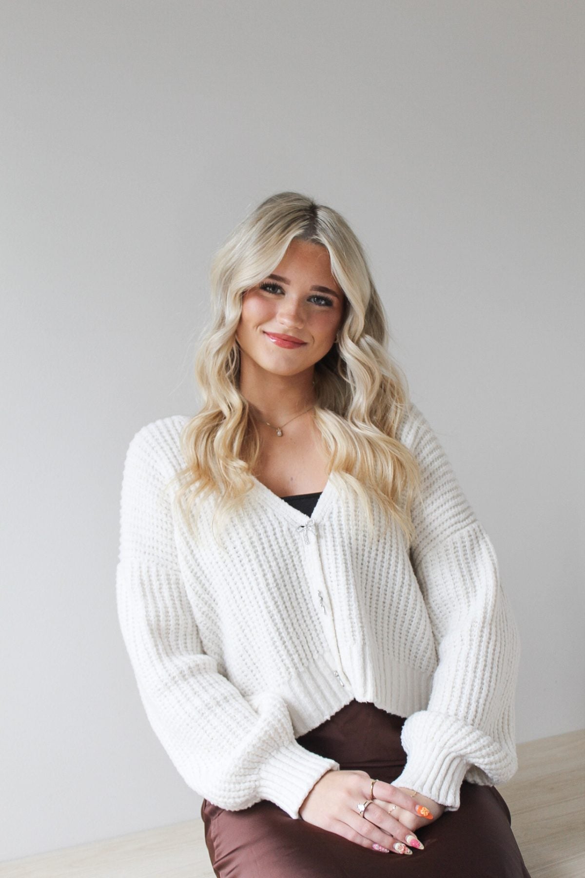 Blythe, lived-in color specialist at Quinn Vise Hair Design in Holland, Michigan.