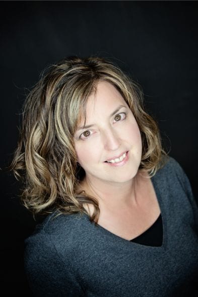 CJ, pixie and short hair specialist at Quinn Vise Hair Design in Holland, Michigan.