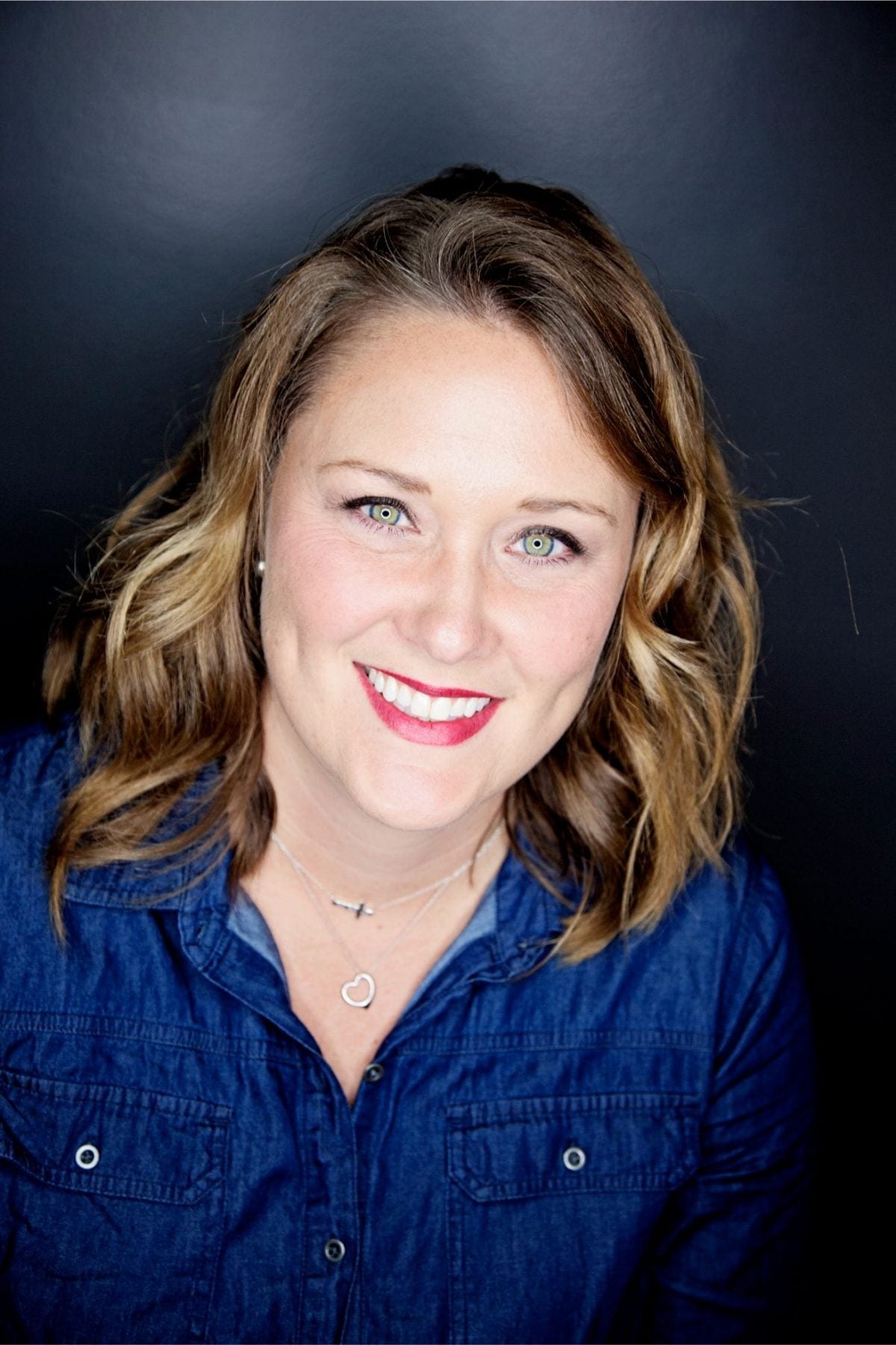 Jennifer, grey blending specialist at Quinn Vise Hair Design in Holland, Michigan.