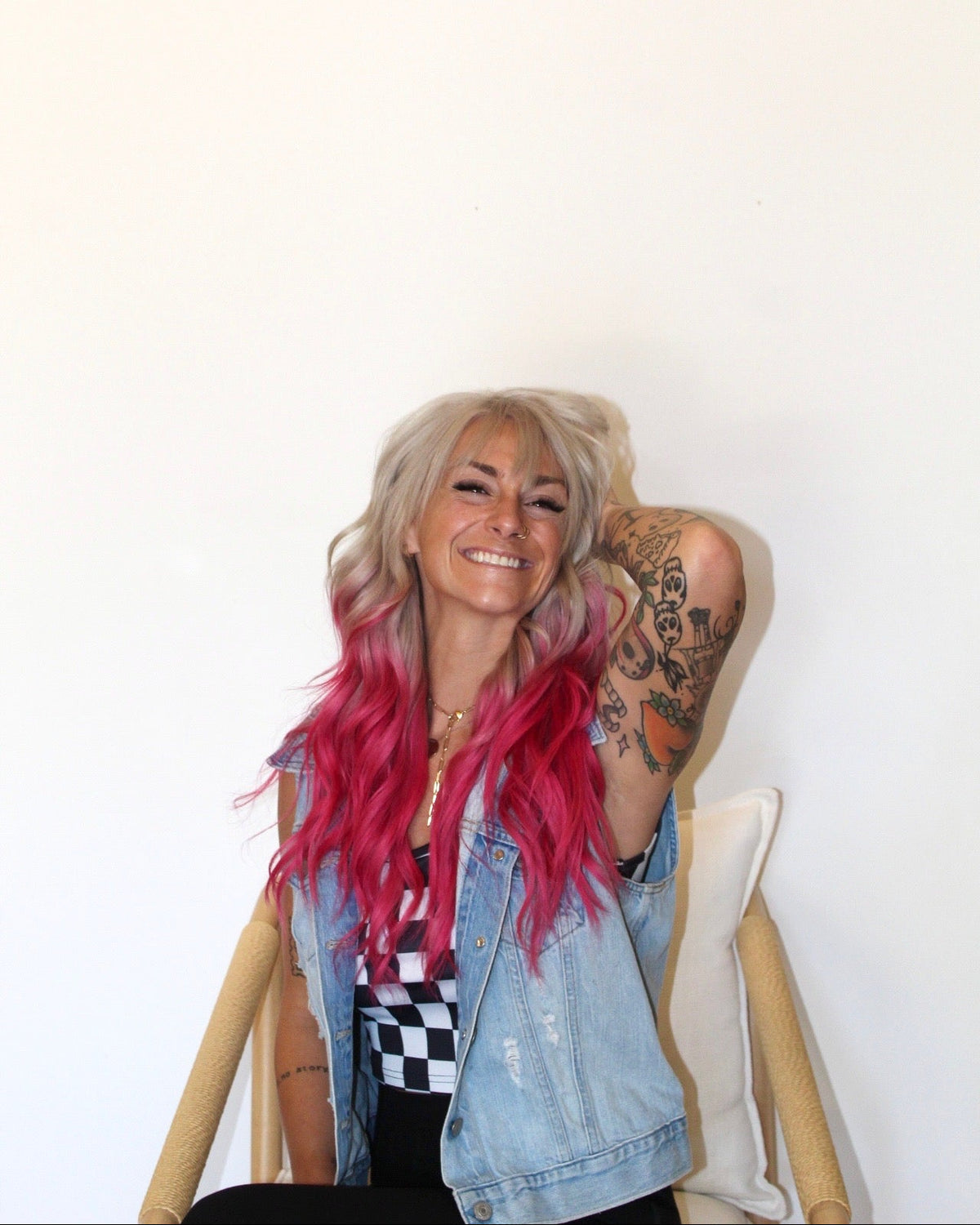 Paige, a vivid and fantasy color specialist at Quinn Vise Hair Design in Holland, Michigan.