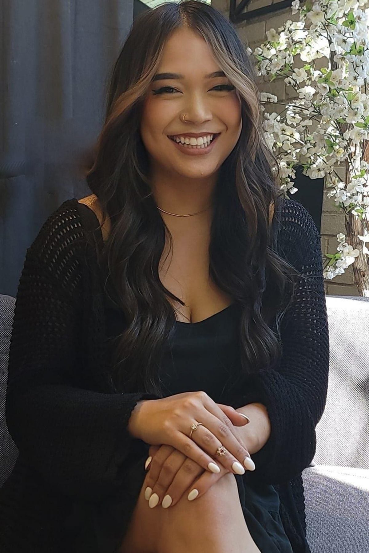 Tida, luxury colorist at Quinn Vise Hair Design in Holland, Michigan.
